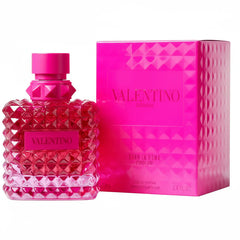 Valentino perfume bottle and packaging with pink design on a white background